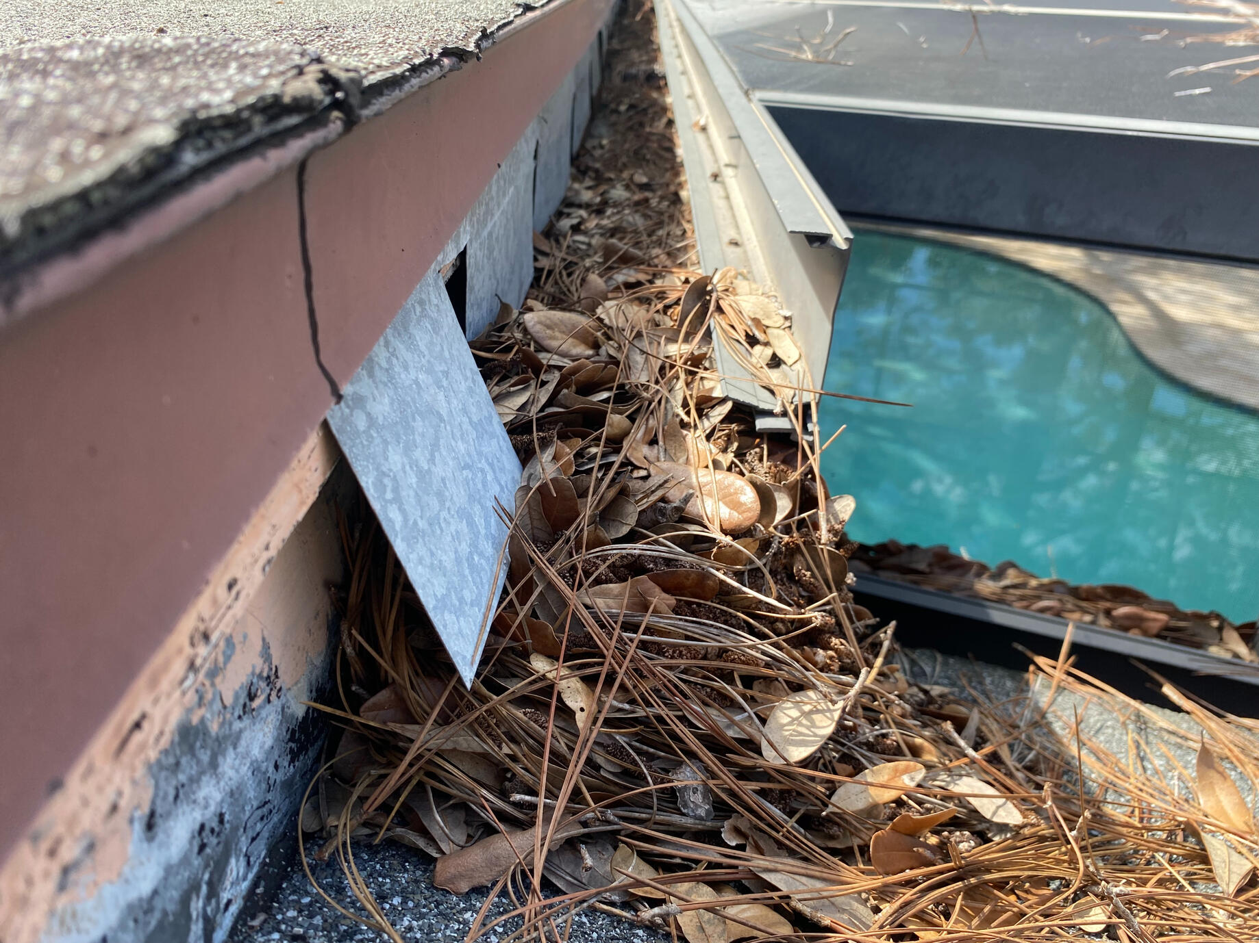 Gutter Sag Repaired Gutters filled with debris