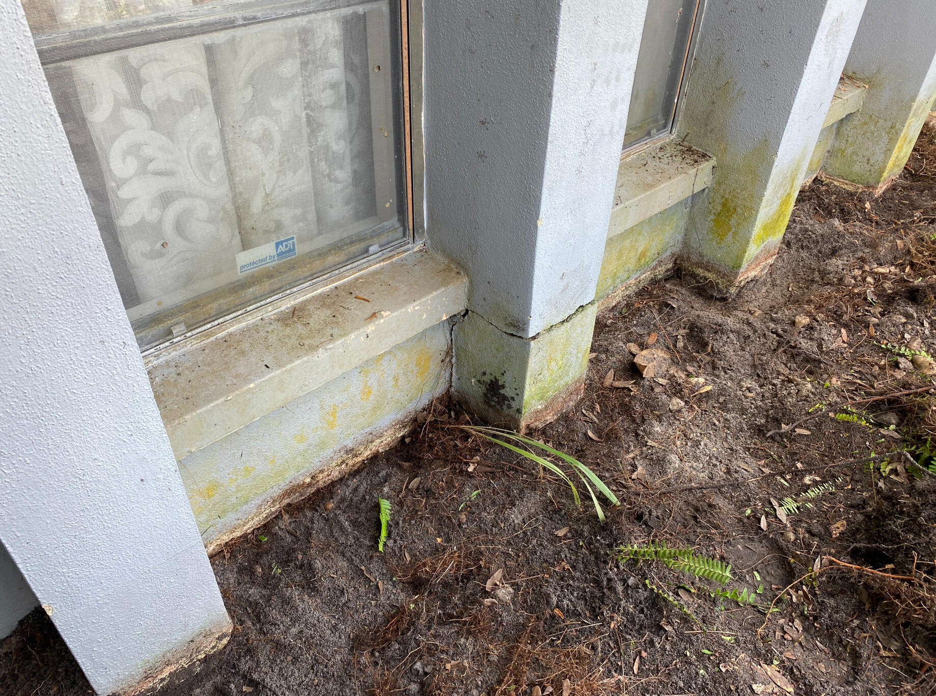Home concrete foundation perimeter and ground contact drainage zone